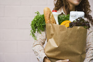 Woman carying groceries